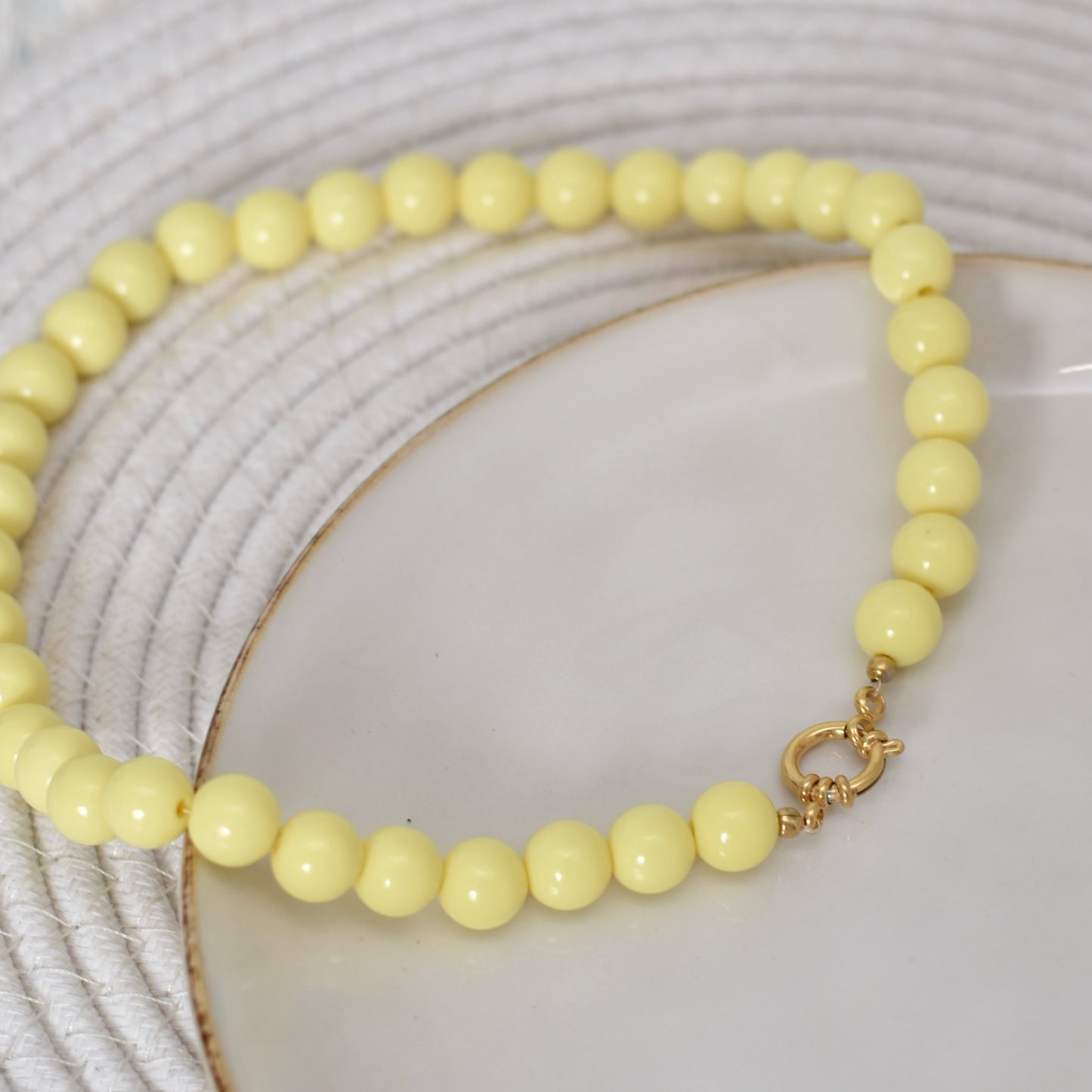 Kralen ketting met boeislot - 5 pastel kleuren 12mm