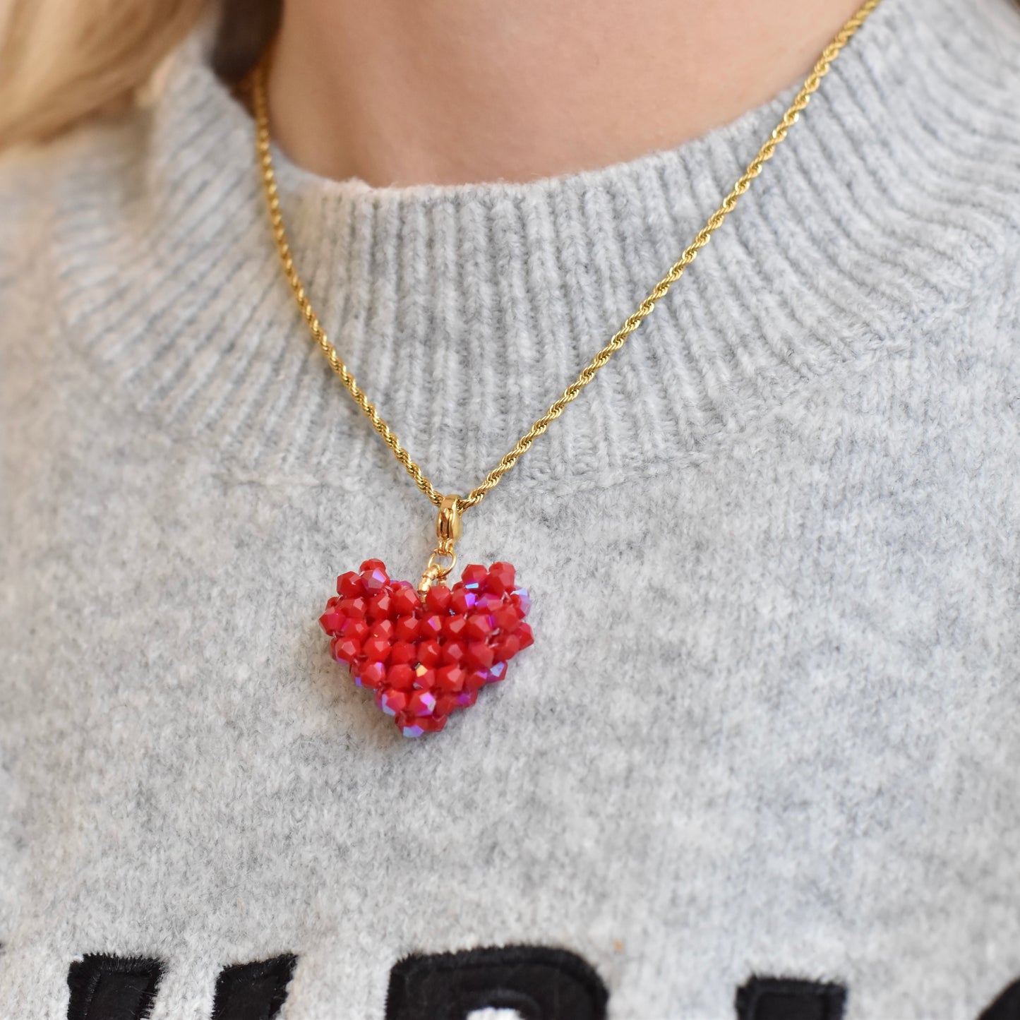 Twist ketting met kralen hart bedel - rood