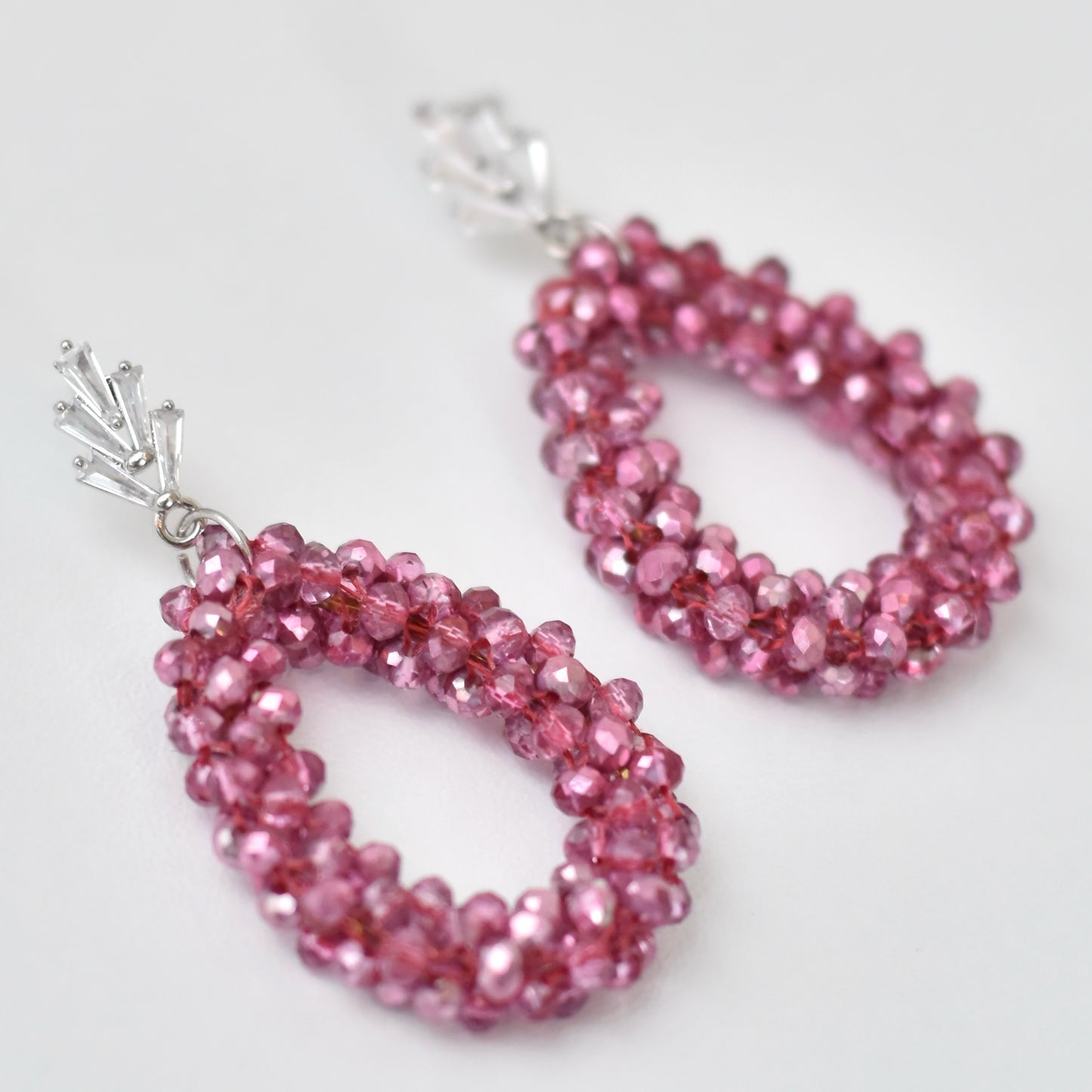 Druppelvormige kralen oorbellen -roze/paars