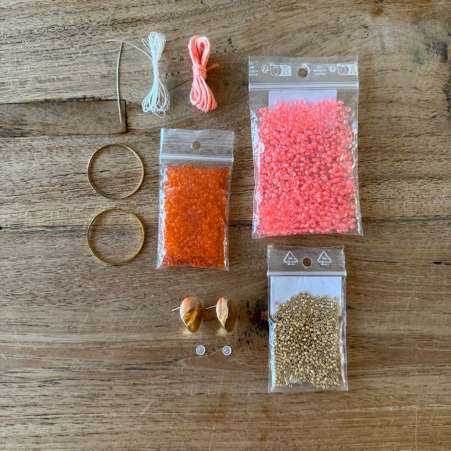 DIY Kralen oorbellen maken - Roze/oranje (Ibiza sunset)