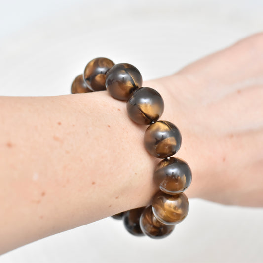 Grote kralen armband bruin gemêleerd