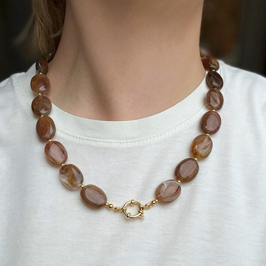 Ovale kralen ketting met boeislot