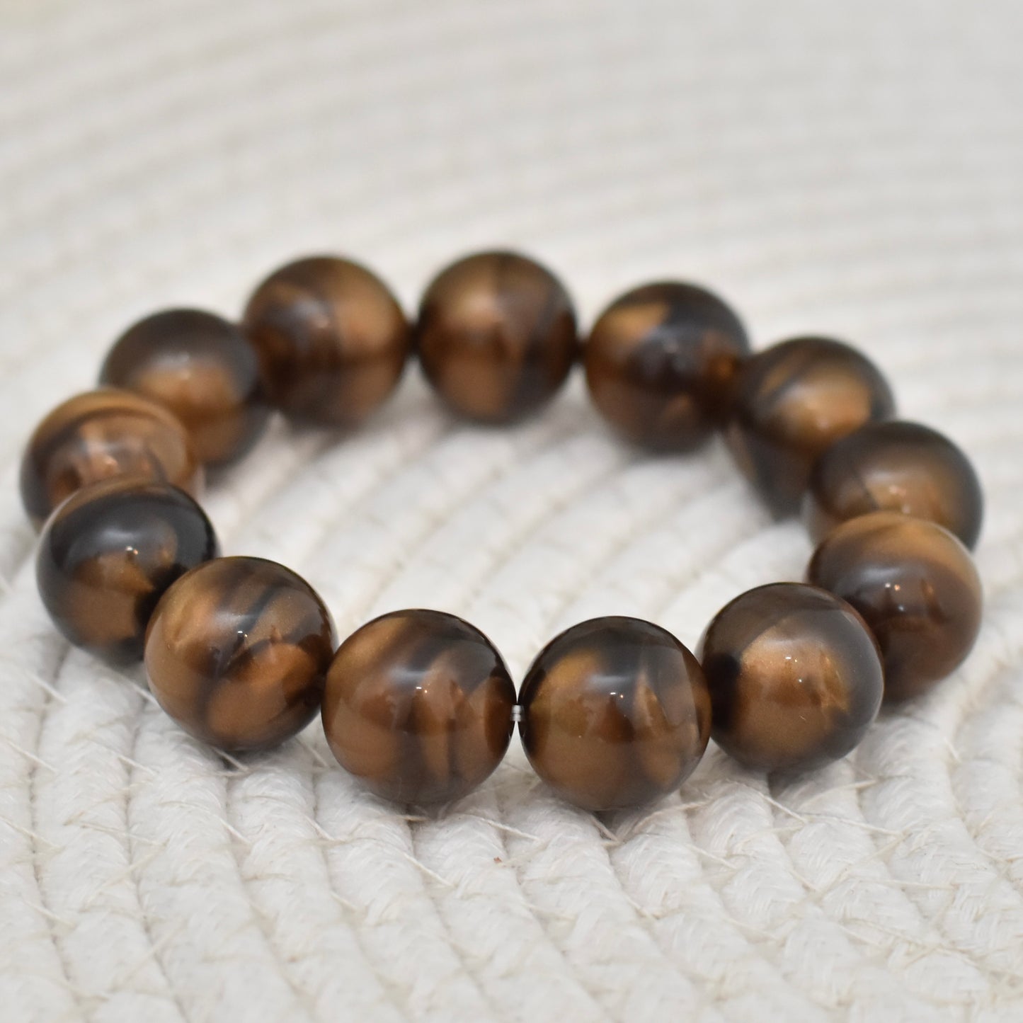 Grote kralen armband bruin gemêleerd