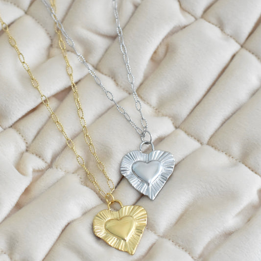 Lange ketting met hart bedel - goud/zilverkleurig